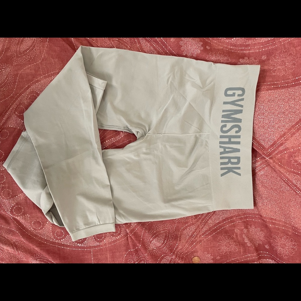 Gymshark leggings! A very small whole penny for reference.